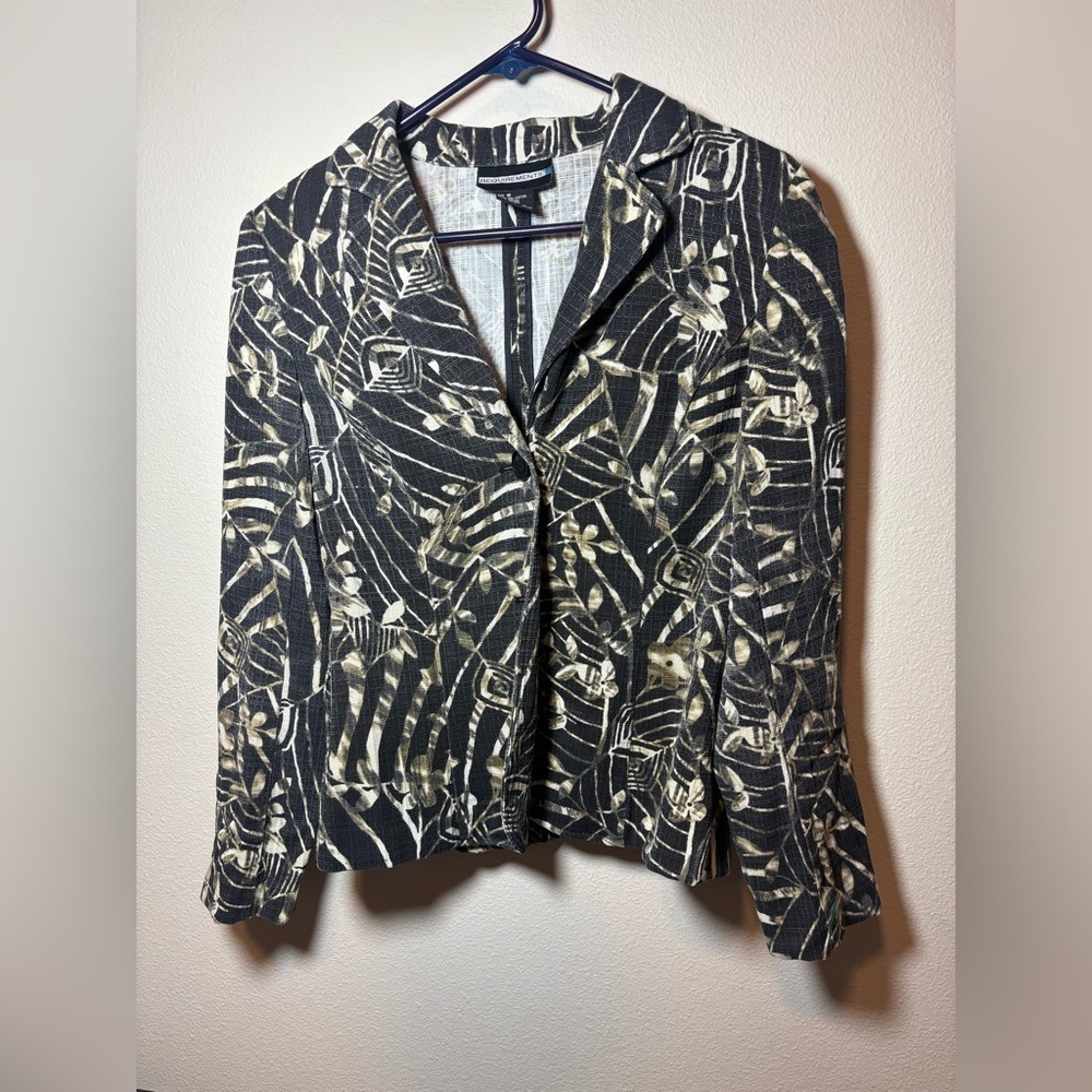 Requirements‎ black and brown print jacket. Size Small